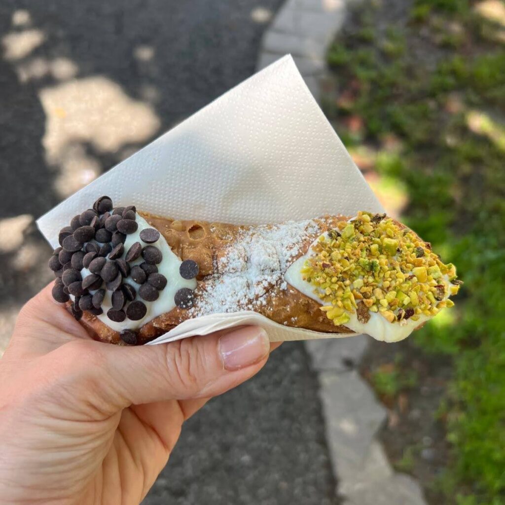 Traditional Sicilian cannolo with crisp pastry shell and sheep’s milk ricotta