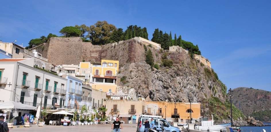 The 16th century Lipari castle seen from Piazza Marina Corta (Secret Sicily walking tour with Walk About Italy)