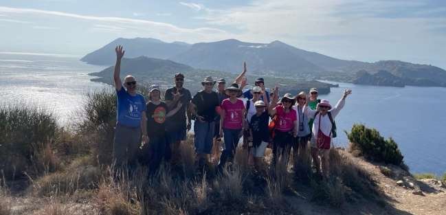 The group with Vulcano in the background (Secret Sicily walking tour with Walk About Italy)