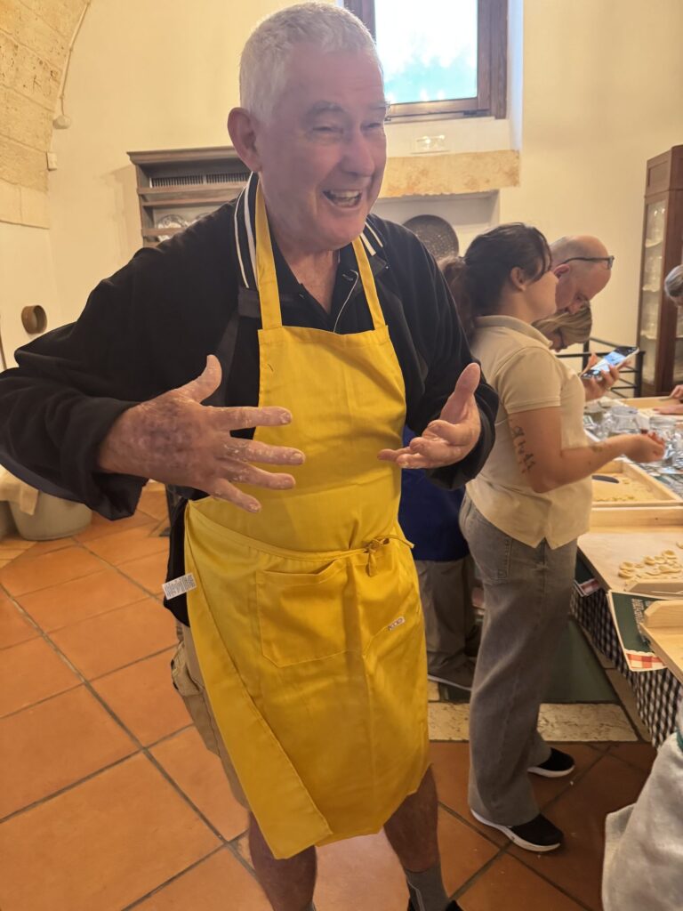 Hands in the flour at the pasta-making class.