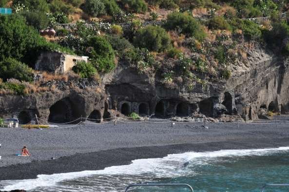 Rinella, with its black sand beach and caves hollowed out of the ancient lava (Secret Sicily walking tour with Walk About Italy)