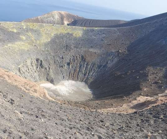 A glimpse inside the caldera, with sulphur staining on the lip of the crater (Secret Sicily walking tour with Walk About Italy)
